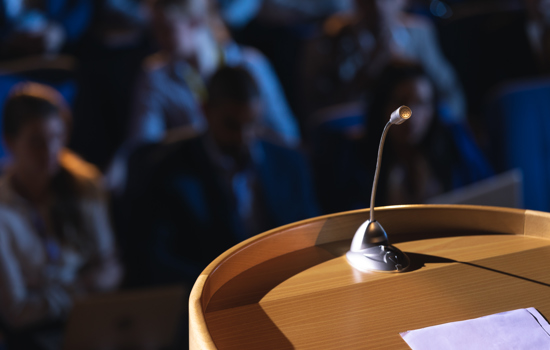 Close Up Of Podium With Speaker In Auditorium HD8C9FQ