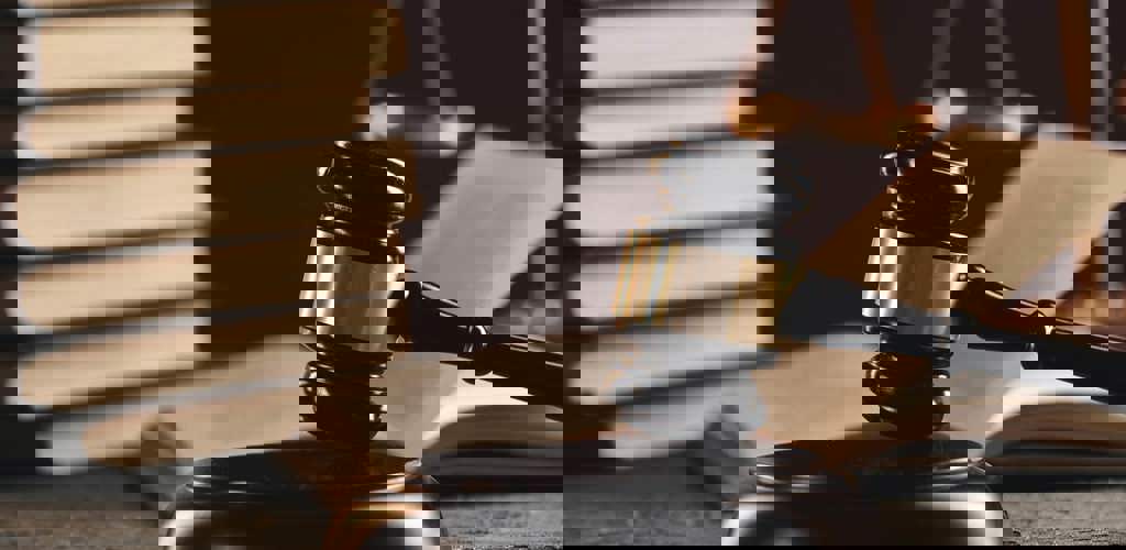 Bigstock Law Concept Open Law Book Wi 316797043